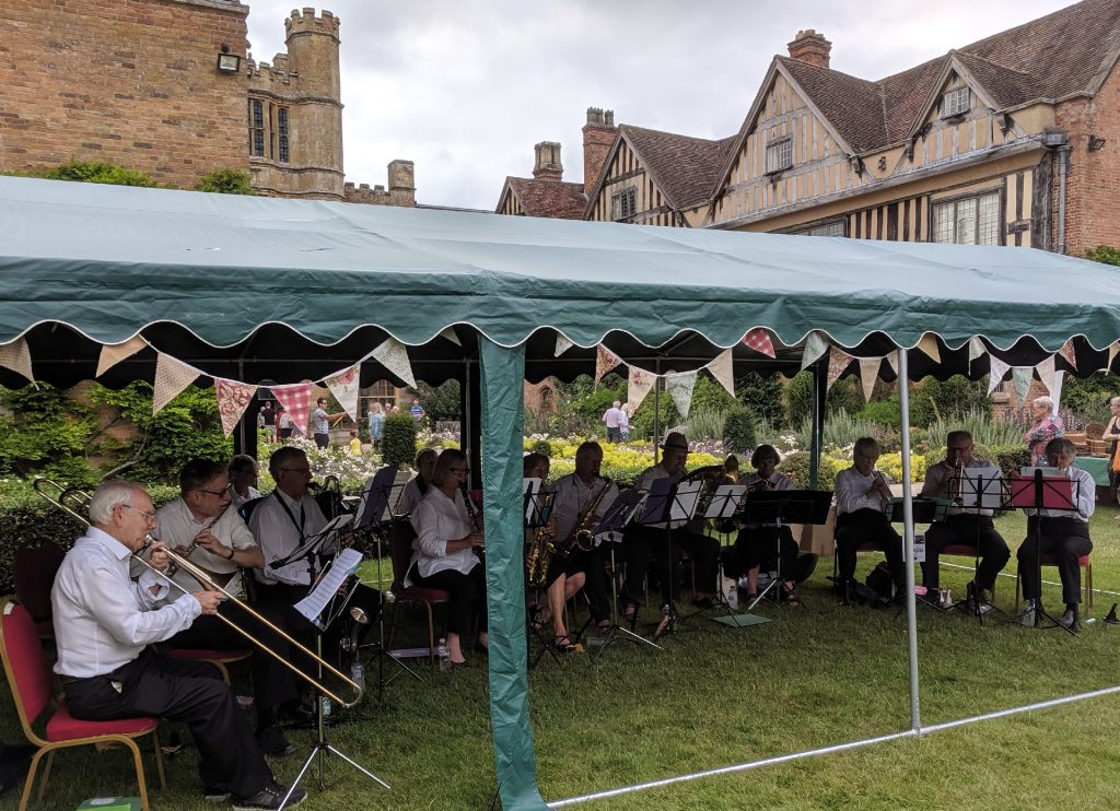 u3a concert band playing at Coughton Court Summer Fete