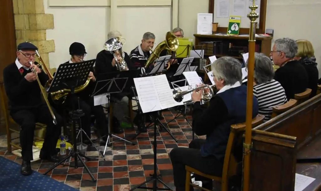 u3a concert band playing at Stoulton Church Rememberance
