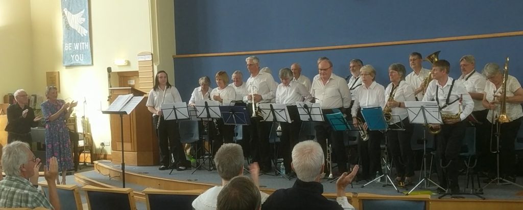 u3a concert band taking a bow at Evesham Methodist church