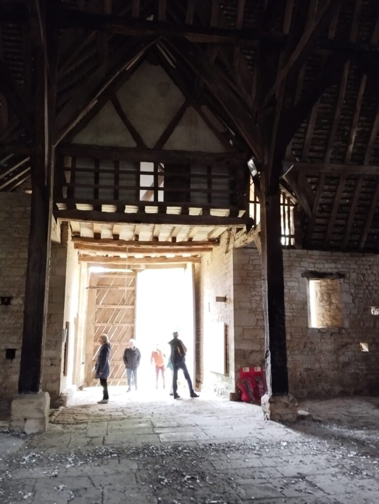 u3a members visit a medieval barn in Bredon