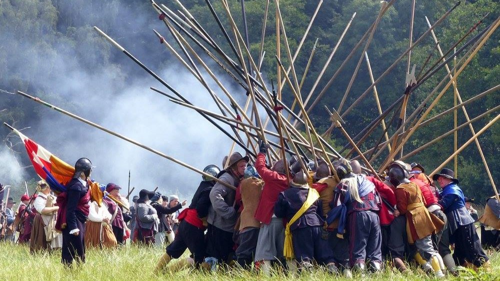 Sealed Knot reenactors in a push of pike