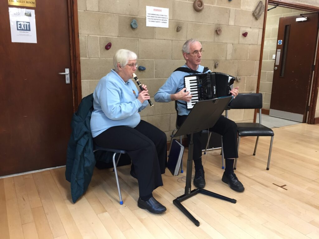 Two musicians - recorder and accordion